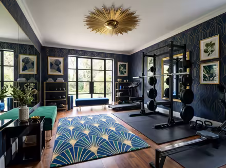 AI-generated art deco home gym interior design: bold geometric patterns
