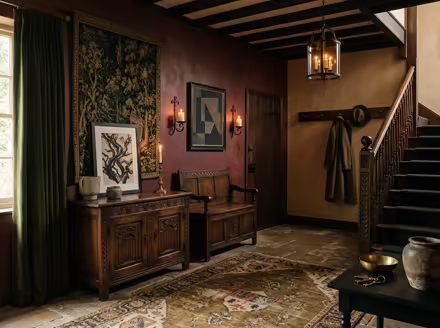 AI-generated castlecore entryway interior design: dark carved-oak furniture