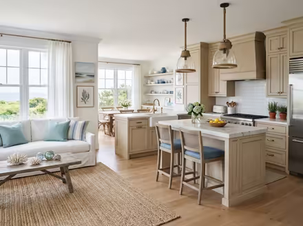 AI-generated coastal kitchen interior design: a white slipcovered sofa with sea-glass blue and striped cushions