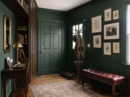 AI-generated dark academia entryway interior design: floor-to-ceiling dark wood bookshelves filled with old books