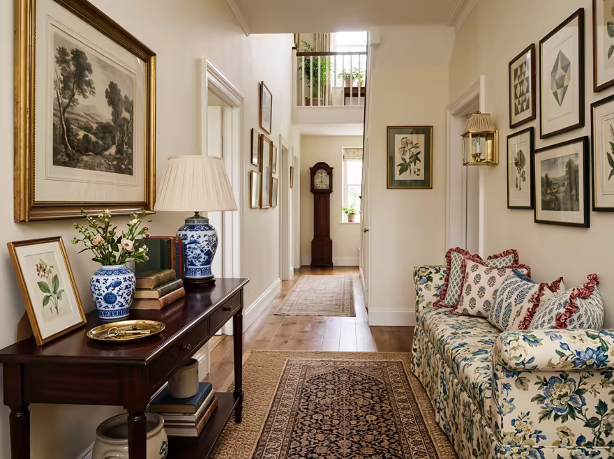 AI-generated grandmillennial hallway interior design: skirted and rolled-arm seating