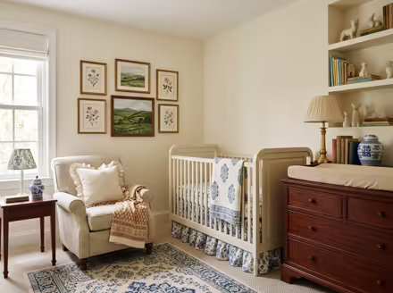 AI-generated grandmillennial nursery interior design: skirted and rolled-arm seating
