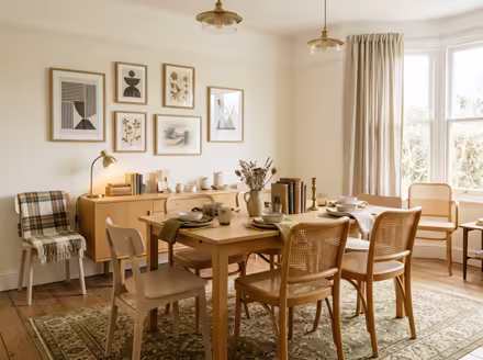 AI-generated light academia dining room interior design: vintage-inspired furniture in lighter woods