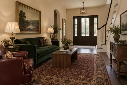 AI-generated modern heritage entryway interior design: heritage color in a home today: one deep forest-green velvet sofa