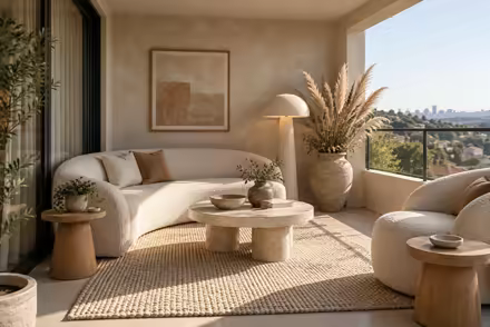 AI-generated organic modern balcony interior design: soft shape everywhere: one curved sculptural sofa in cream boucle