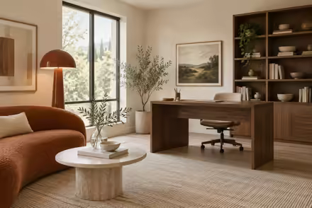 AI-generated scanditalia home office interior design: Scandinavian restraint with Italian warmth: one curved sofa in terracotta or ochre boucle