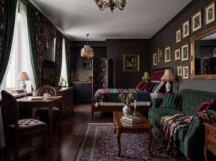 AI-generated victorian studio apartment interior design: button-tufted seating