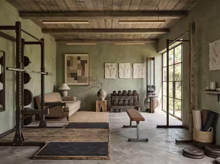 AI-generated wabi-sabi home gym interior design: raw imperfect textures