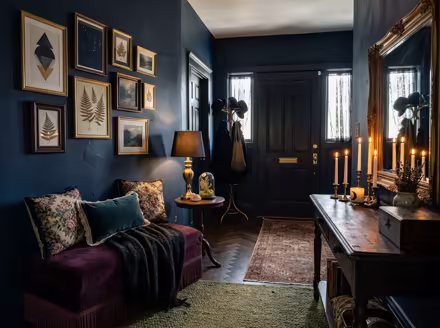 AI-generated whimsigoth entryway interior design: a velvet sofa in inky plum